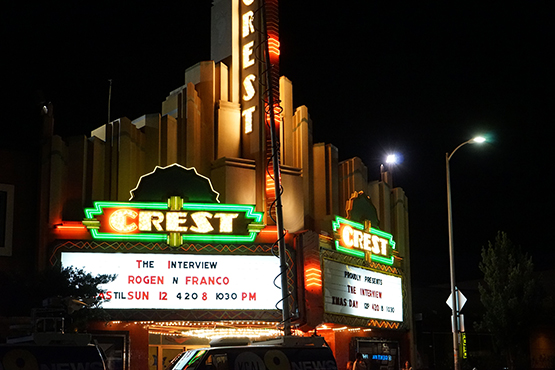 Crest theater neon sign at night